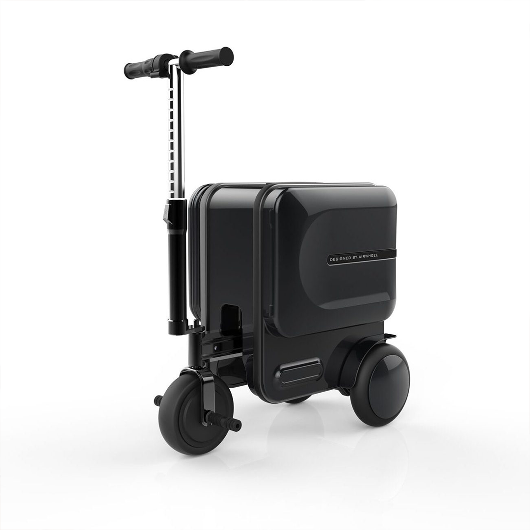 Black scooter with suitcase attachment on a white background