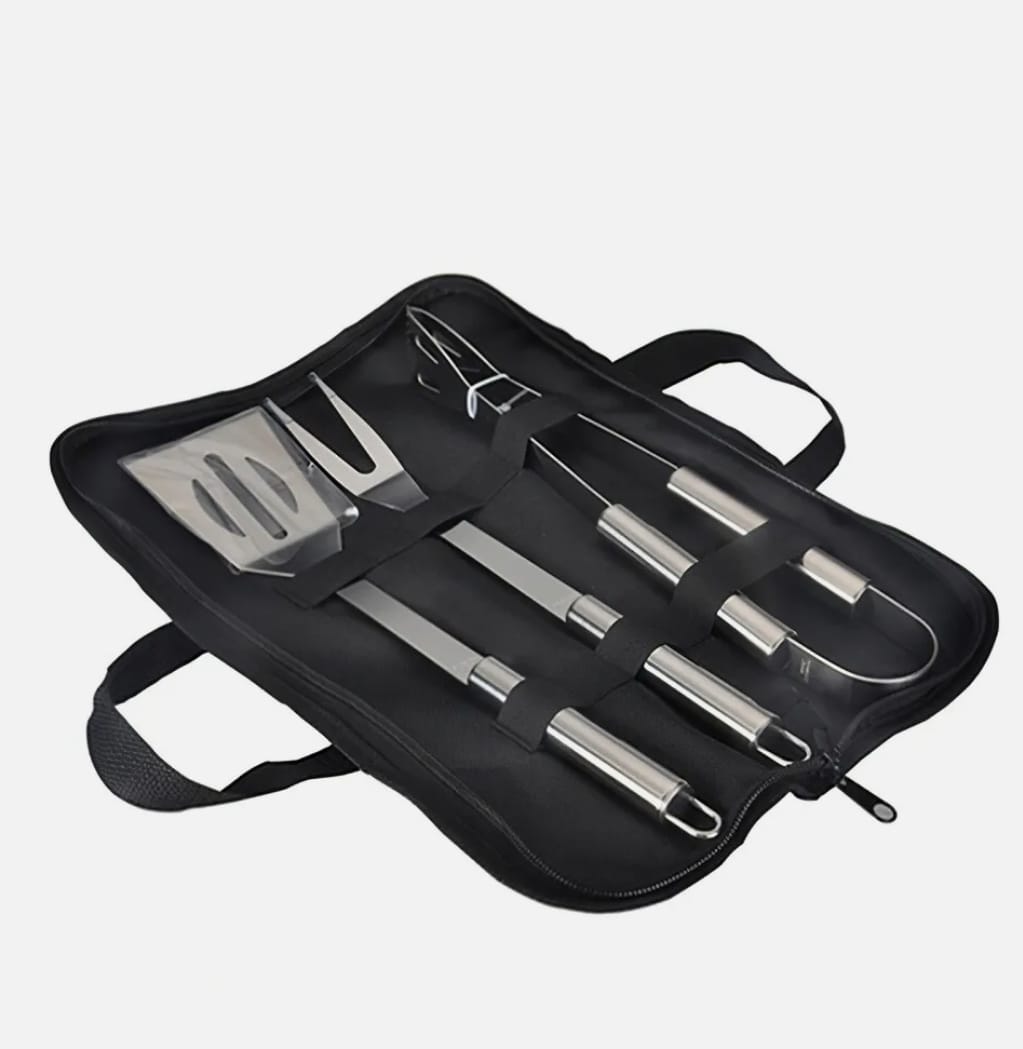 Set of stainless steel barbecue tools in a black carrying case on a white background