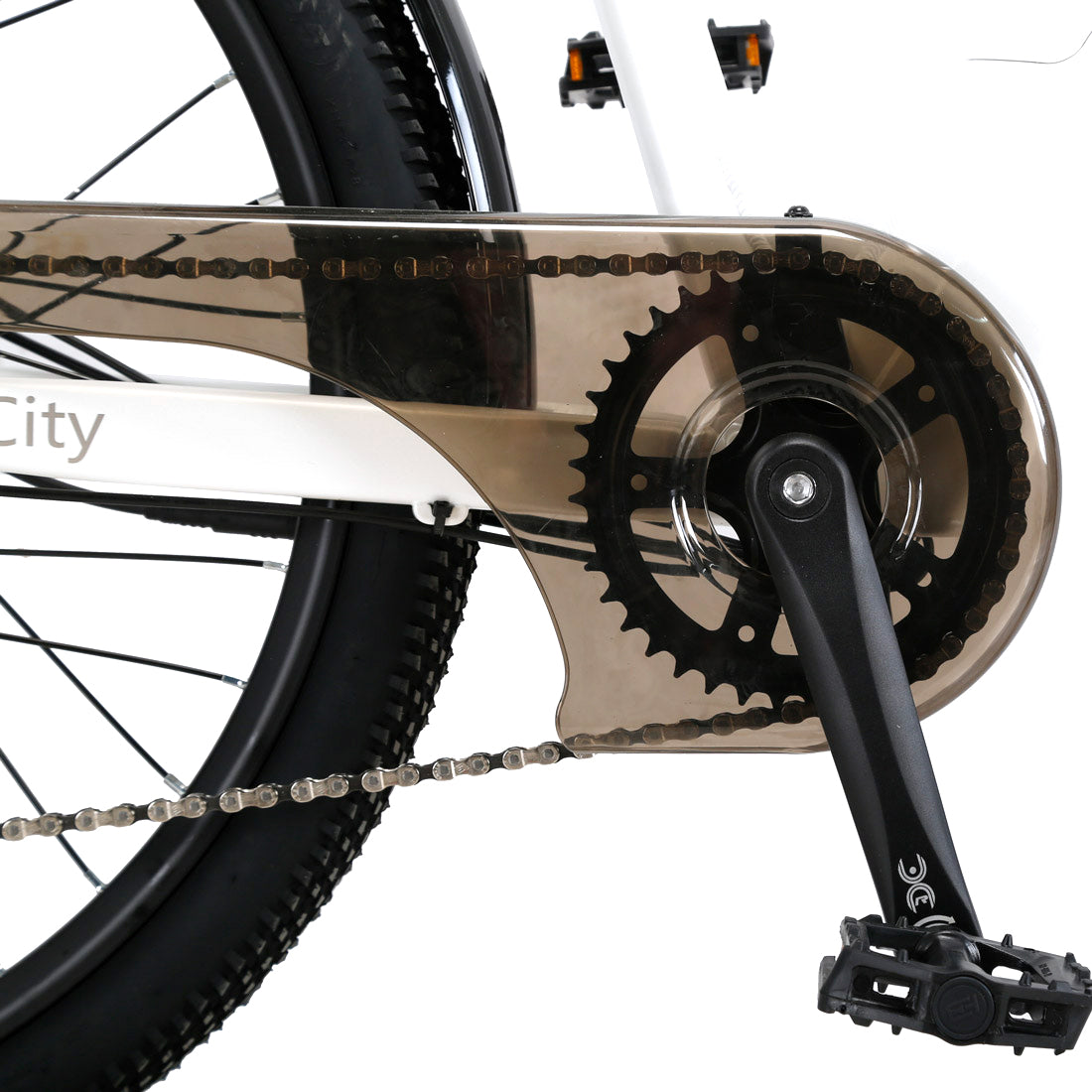 Close-up of a bicycle chain and gear system on a white background