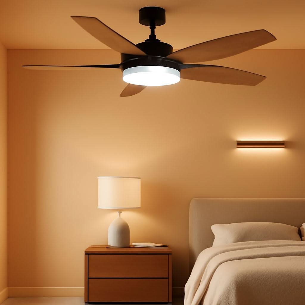 Ceiling fan with light fixture in a bedroom setting