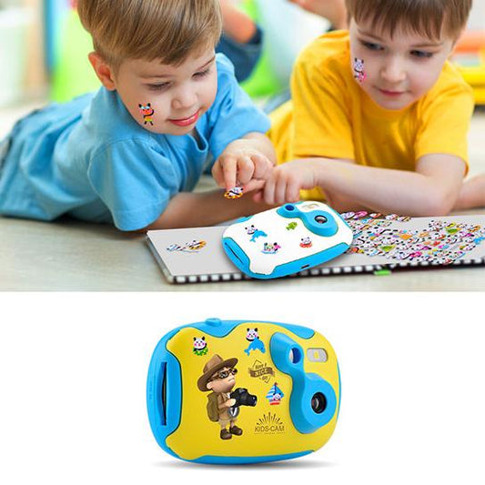 Two children playing with a toy camera on a table.