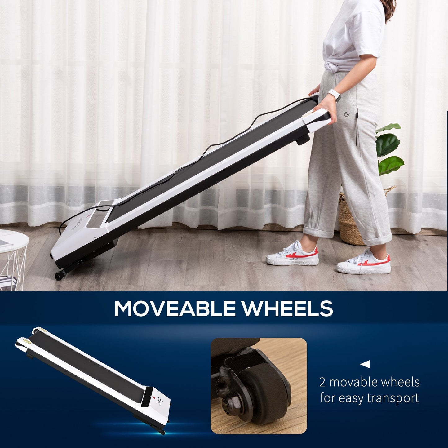 Person holding a long, flat device with moveable wheels on a wooden floor.