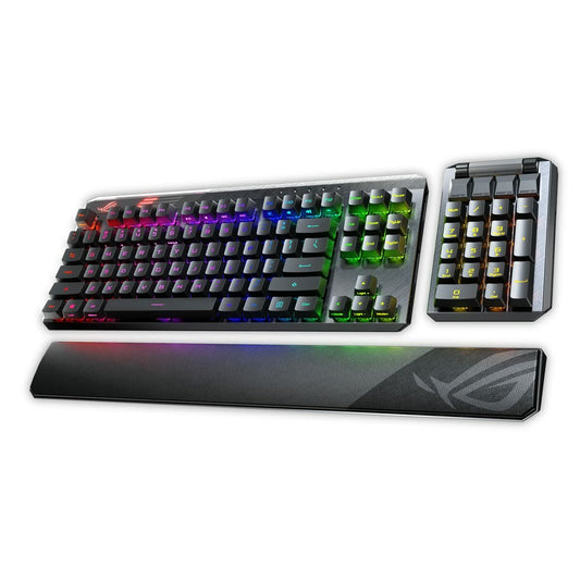Gaming keyboard with RGB lighting, wrist rest, and additional keypad on a white background. Computer parts and accessories for sale. Axis-Dynamics