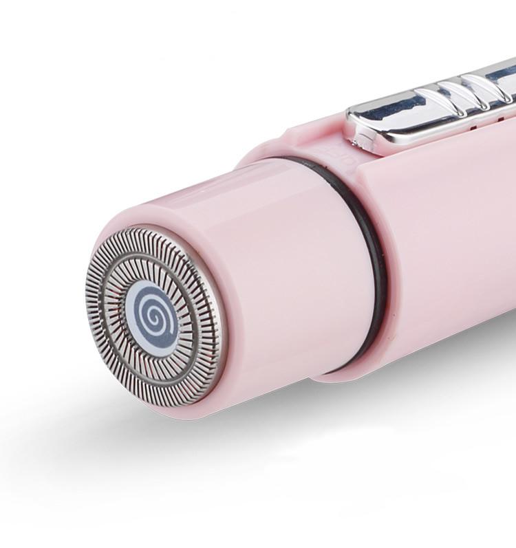 Pink electric shaver on a white background. able components on a white background. Best onine retail store. Axis-Dynamics