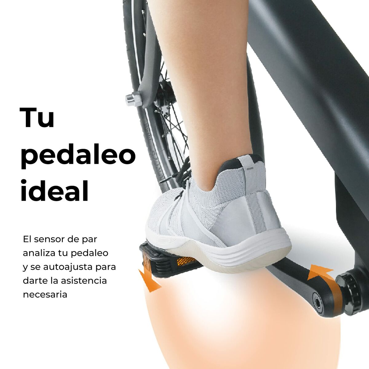Person pedaling a stationary bike with text about pedal assistance system