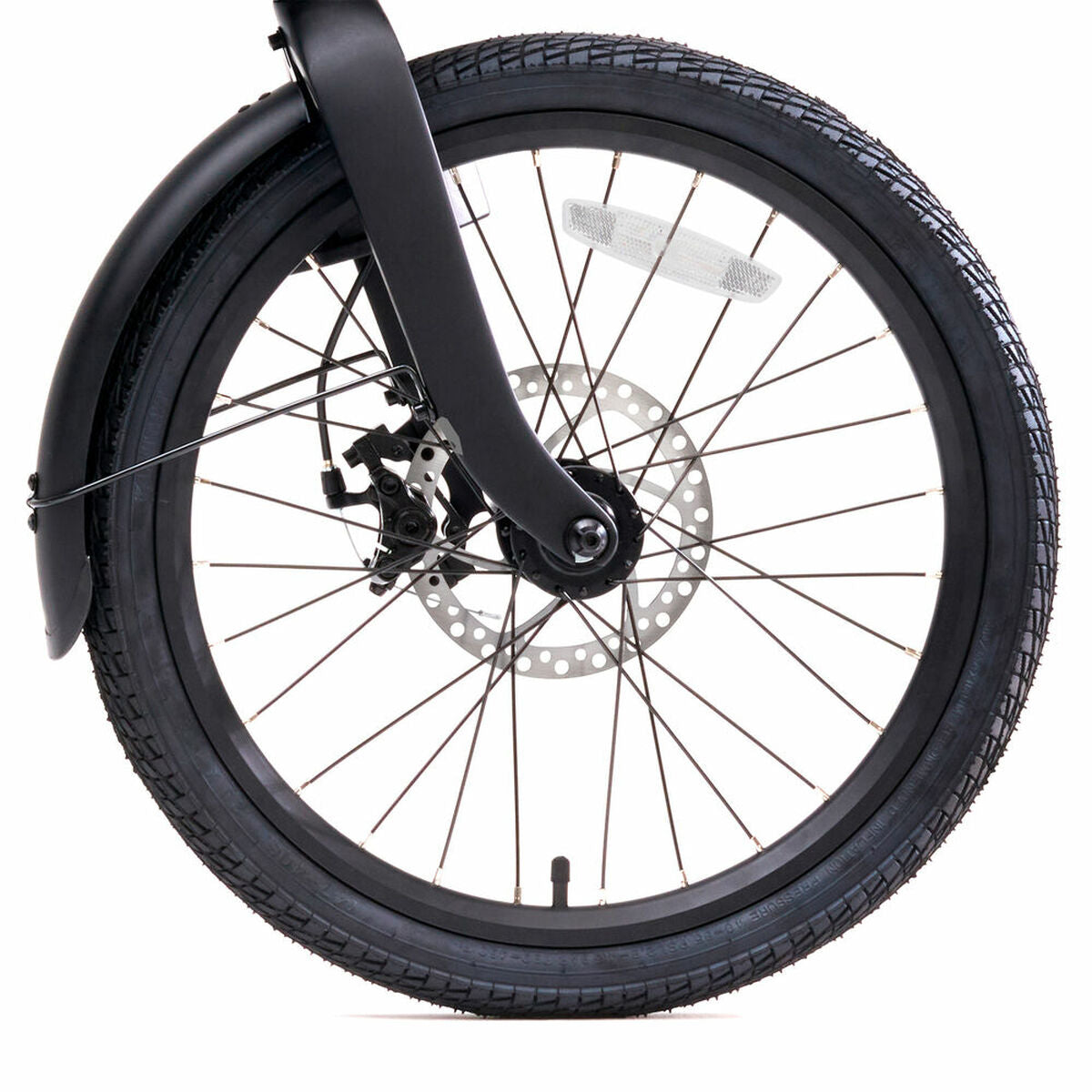 Close-up of a bicycle wheel with a white background