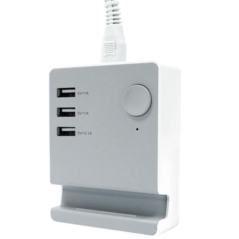 White USB charging station with multiple ports on a white background