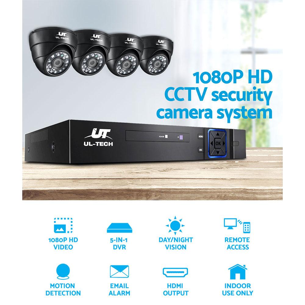 UL-TECH 1080P HD CCTV security camera system with four cameras and a DVR on a wooden surface.