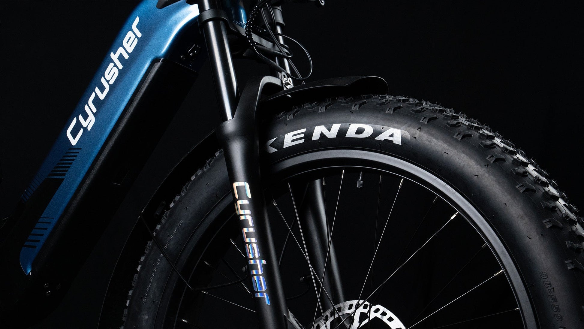 Close-up of a bicycle wheel with 'Cyrusher' branding on a black background