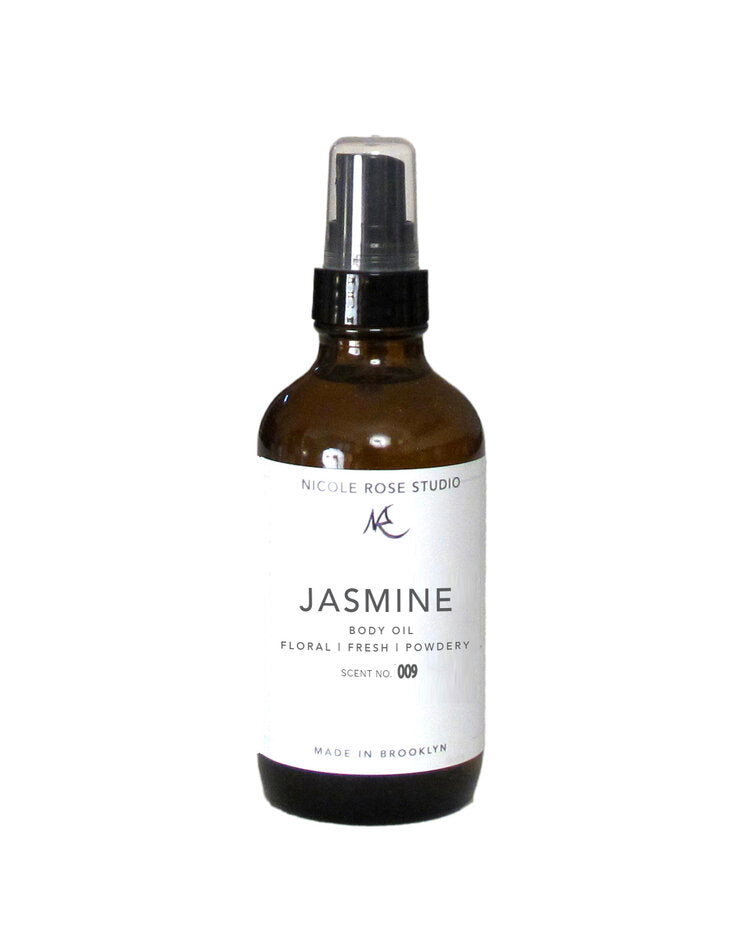 Brown spray bottle labeled 'Jasmine' from Nicole Rose Studio on a white background. Best online retail store. Axis-Dynamics