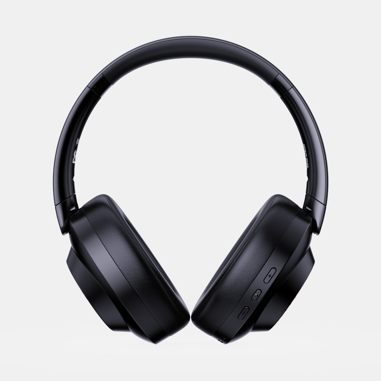Black headphones on a light gray background