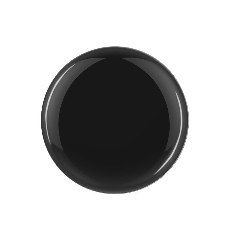 Black circular object on a white background