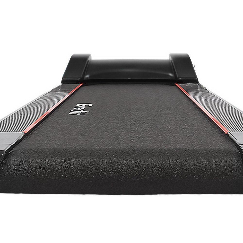 Black and red treadmill on a white background