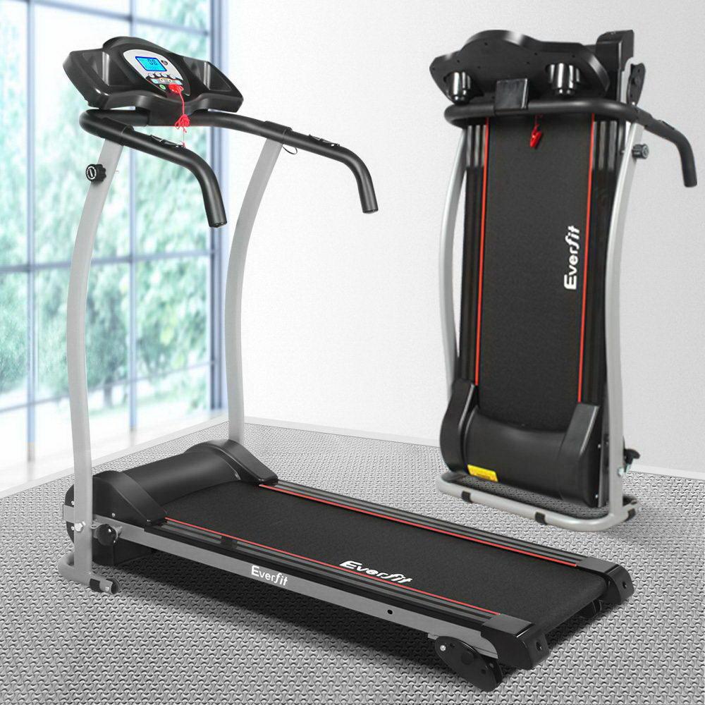 Two Everfit treadmills on a gray floor with a window in the background