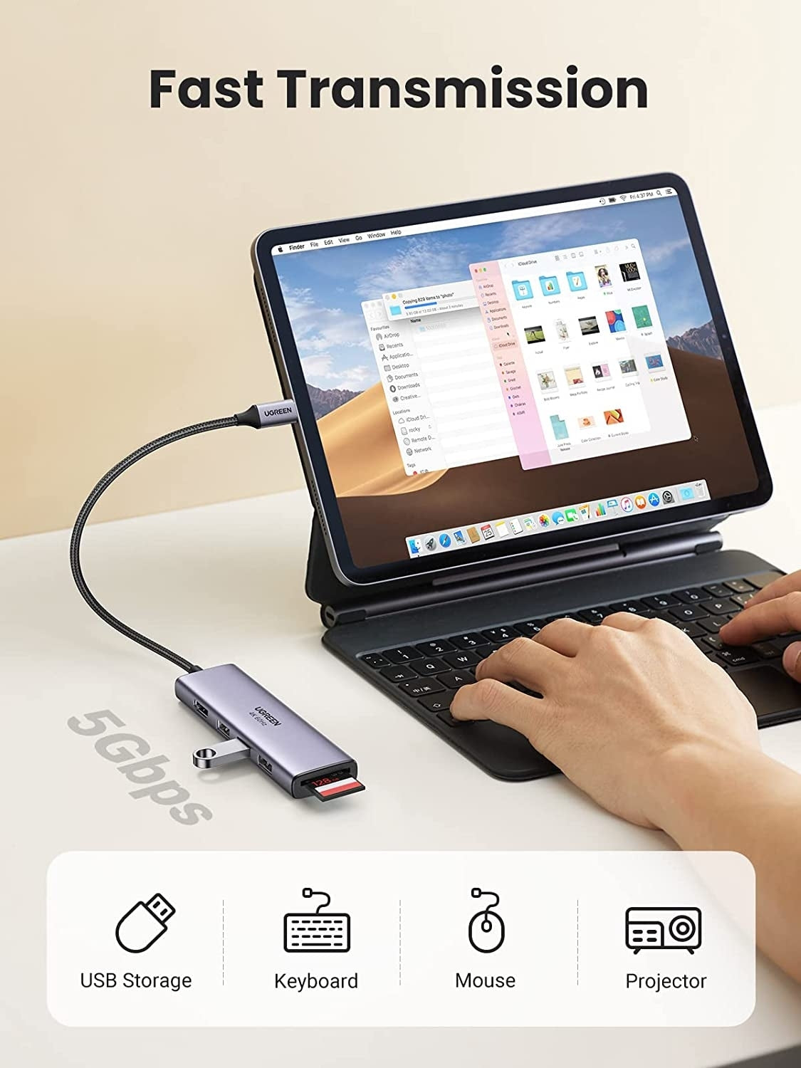 Laptop with USB device connected, displaying file explorer on screen, on a light surface.