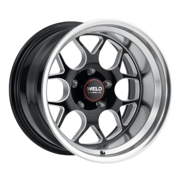 Car wheel rim with black and chrome finish on a white background