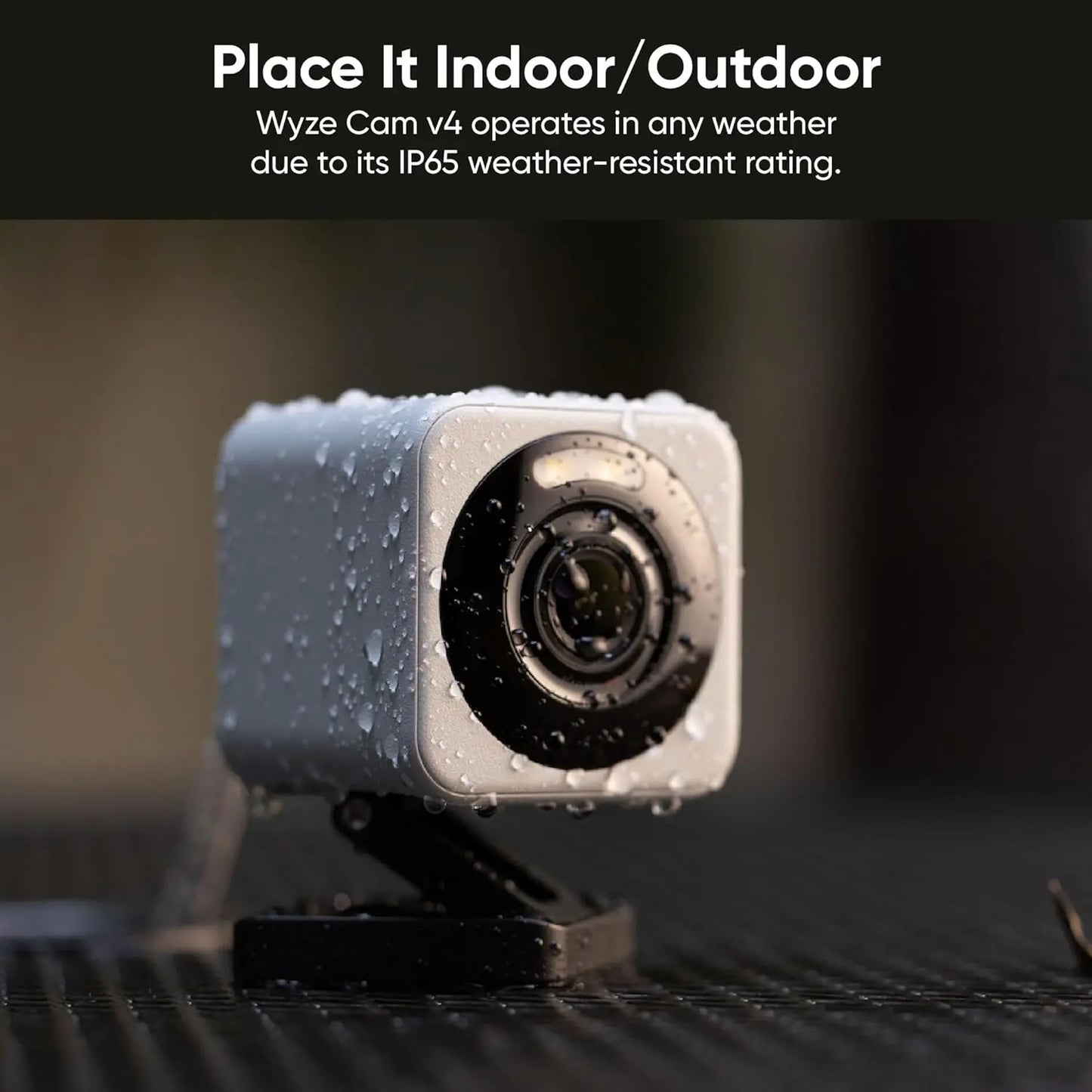 Wyze Cam v4 weather-resistant security camera on a dark surface with text about its IP65 rating.