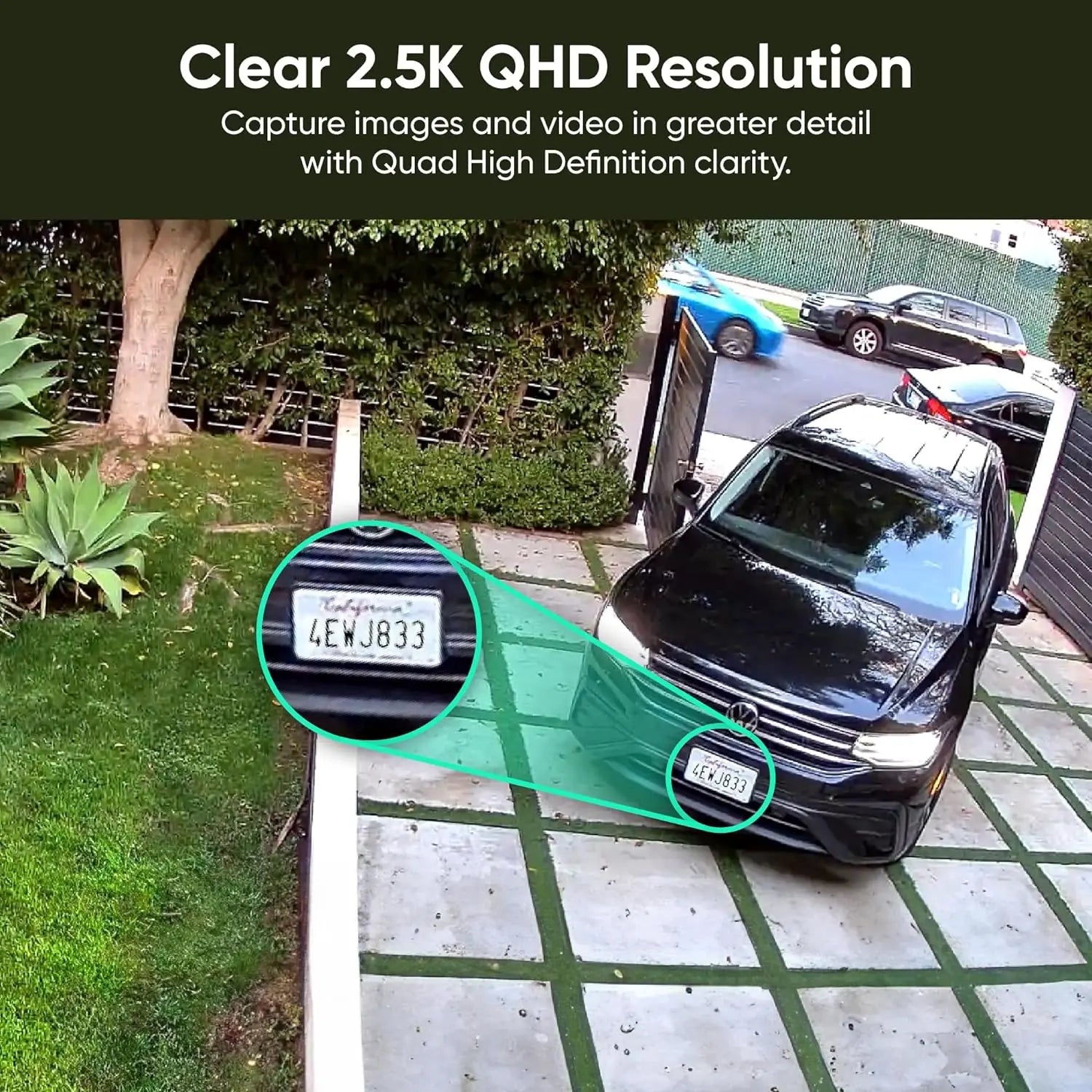 Car parked on a driveway with clear 2.5K QHD resolution text overlay