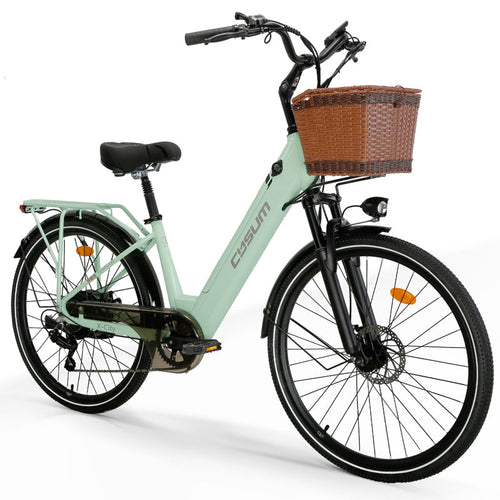 Light green electric bicycle with a brown basket on a white background