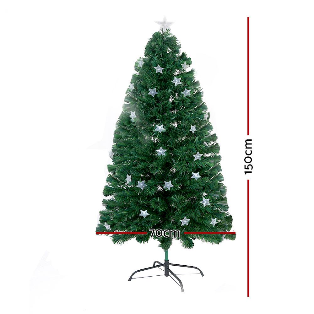 A green artificial Christmas tree with silver star ornaments on a black metal stand, shown with red dimension lines indicating a height of 150cm and a width of 70cm on a white background. Axis-Dynamics online retail store