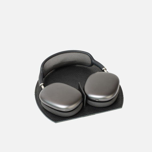 Pair of gray headphones on a white background