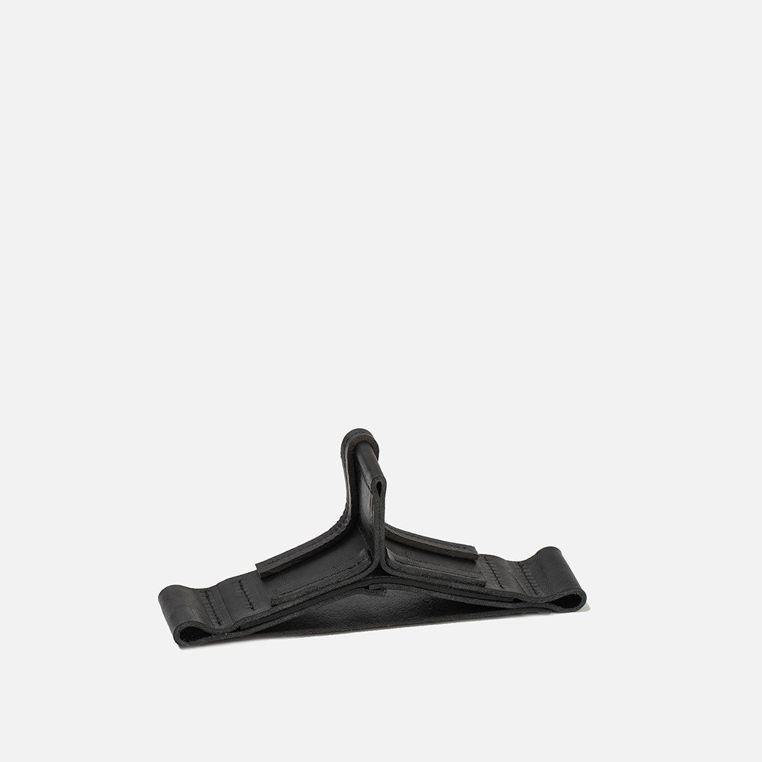 Black plastic clip on a white background