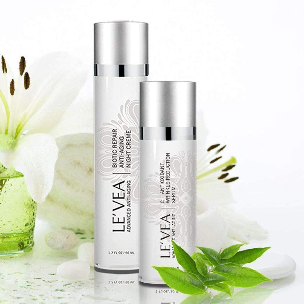 Two Le'Vea skincare bottles with a floral background. Best online retail store. Axis-Dynamics