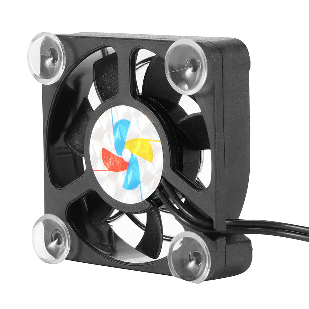 Small black fan with a colorful propeller on a white background. Best electronics online store near me. Axis-Dynamics
