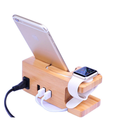 Wooden charging station with phone, watch, and multiple ports on a white background