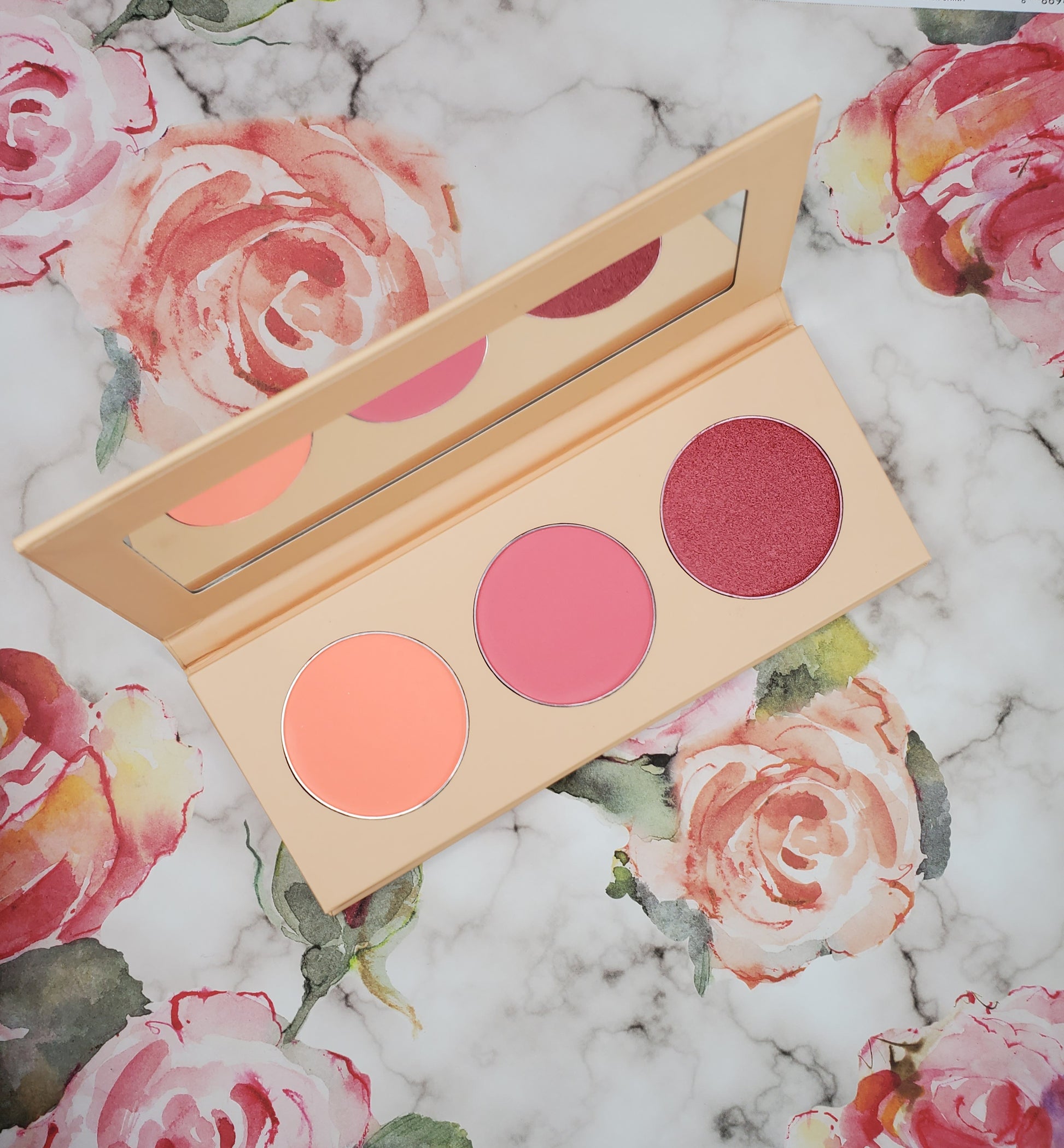 Makeup palette with pink shades on a floral and marble background. best body wash for severely dry sensitive skin