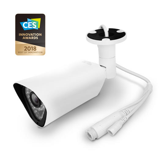 White security camera with CES Innovation Award badge on a white background