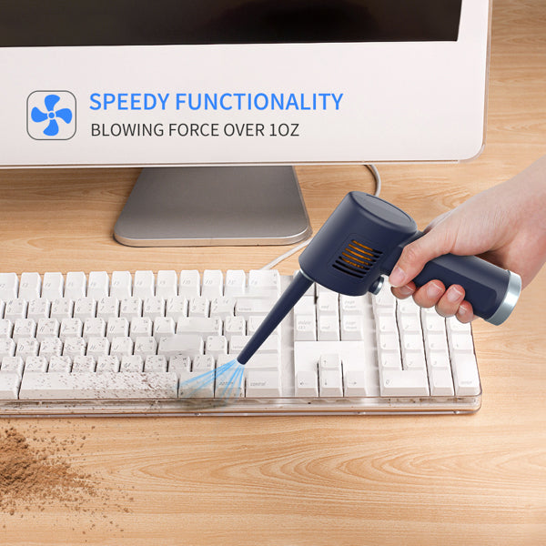 Person cleaning a computer keyboard with a blower gun on a wooden desk. Computer parts and accessories for sale. Axis-Dynamics