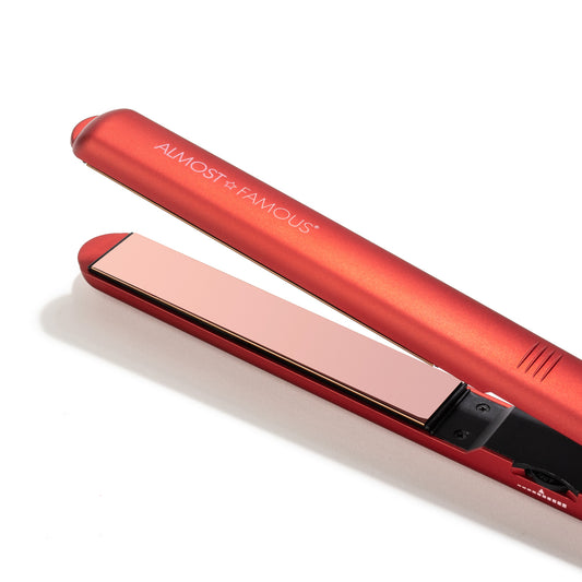 Red hair straightener with 'Almost Famous' branding on a white background.  Best online retail store. Axis-Dynamics