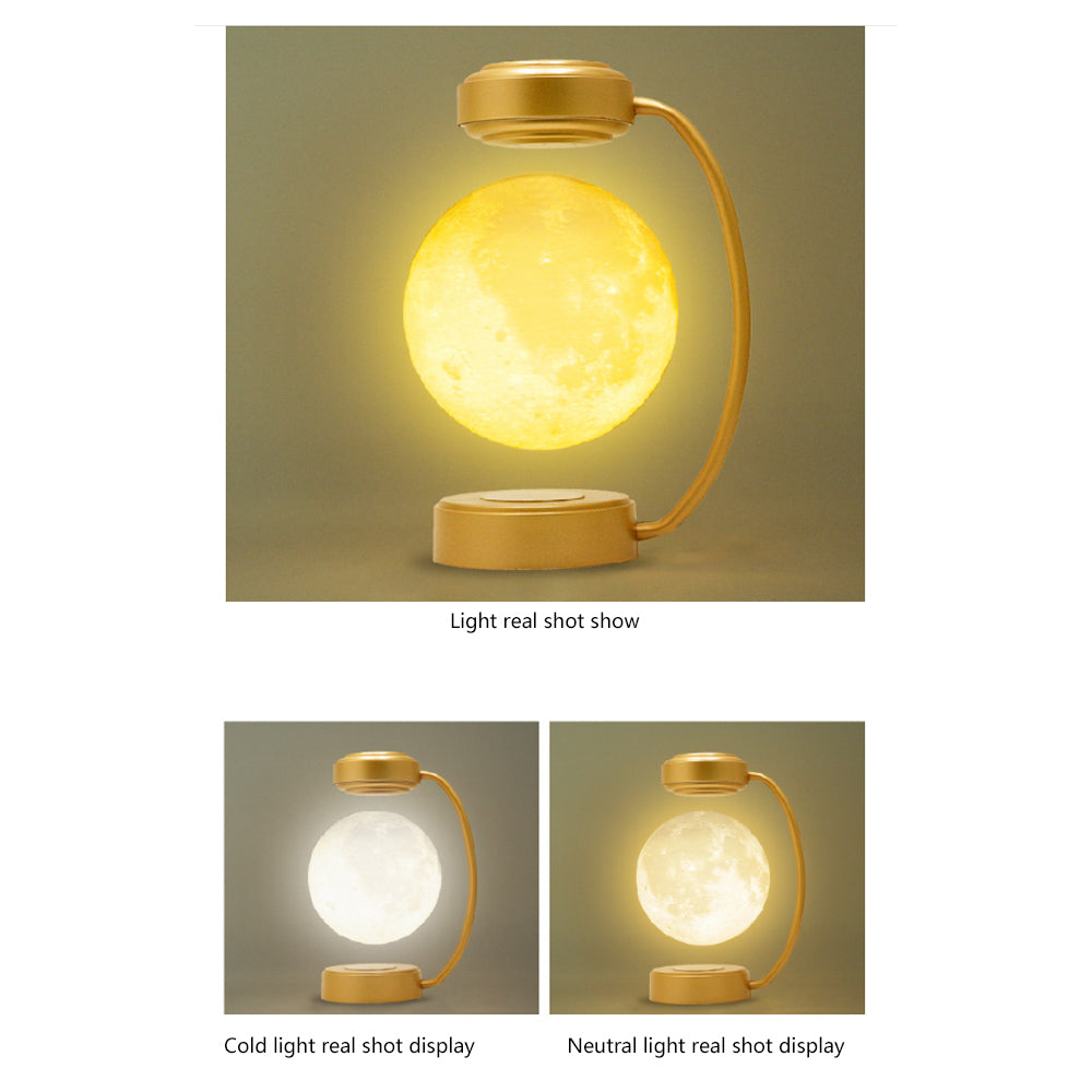 Moon-shaped lamp with gold base and neck, showing light real shot on a beige background.