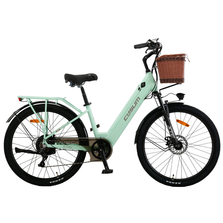Mint green electric bicycle with a brown basket on a white background