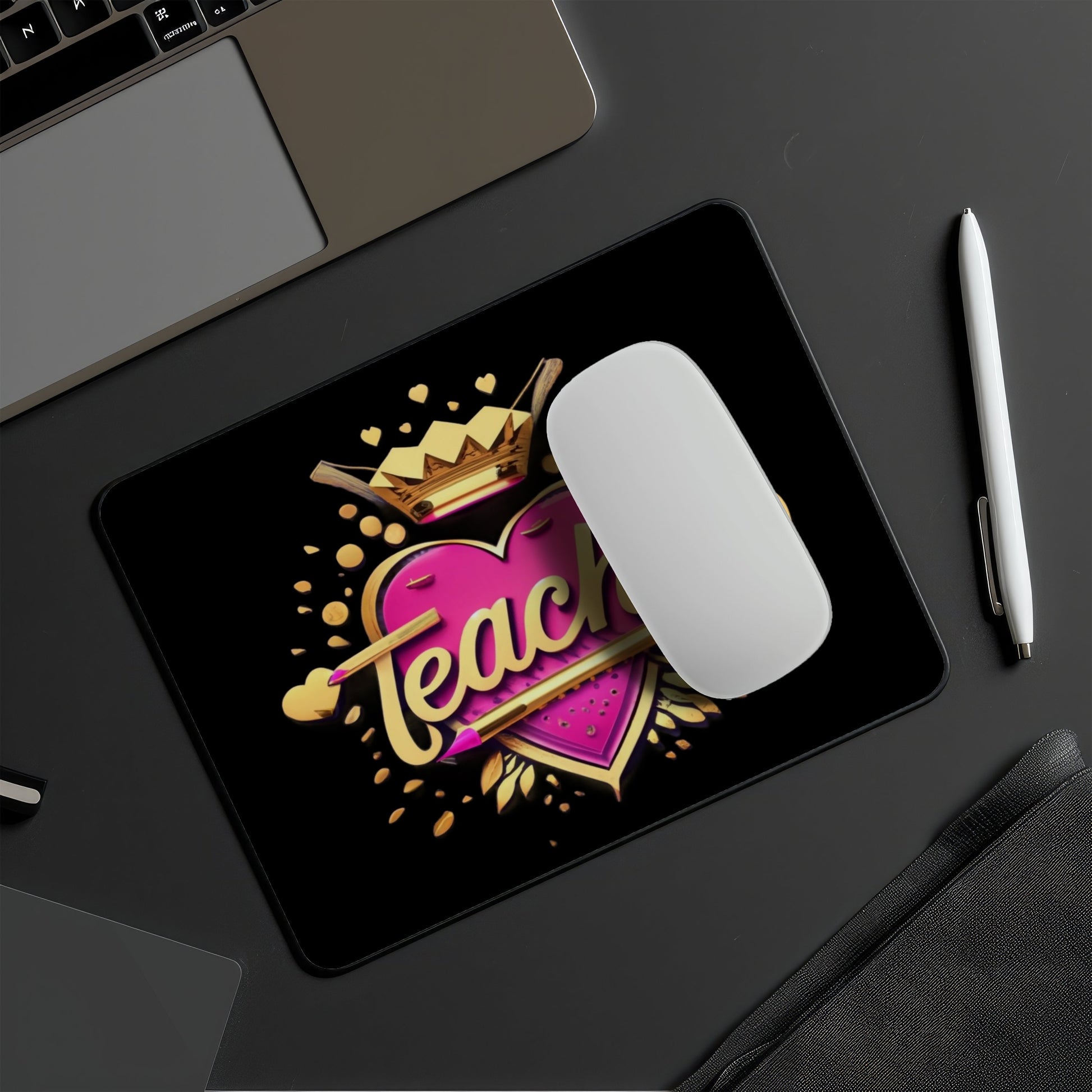 Mouse pad with 'Teach' design on a desk with a laptop, mouse, and pen. magnetic switch rapid trigger gaming keyboard. Axis-Dynamics