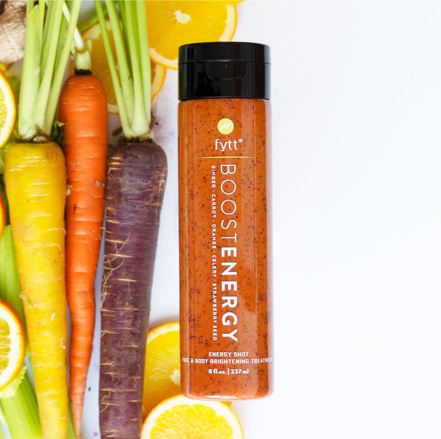 Fytt Boost Energy product with carrots and oranges on a white background. Best online retail store. Axis-Dynamics
