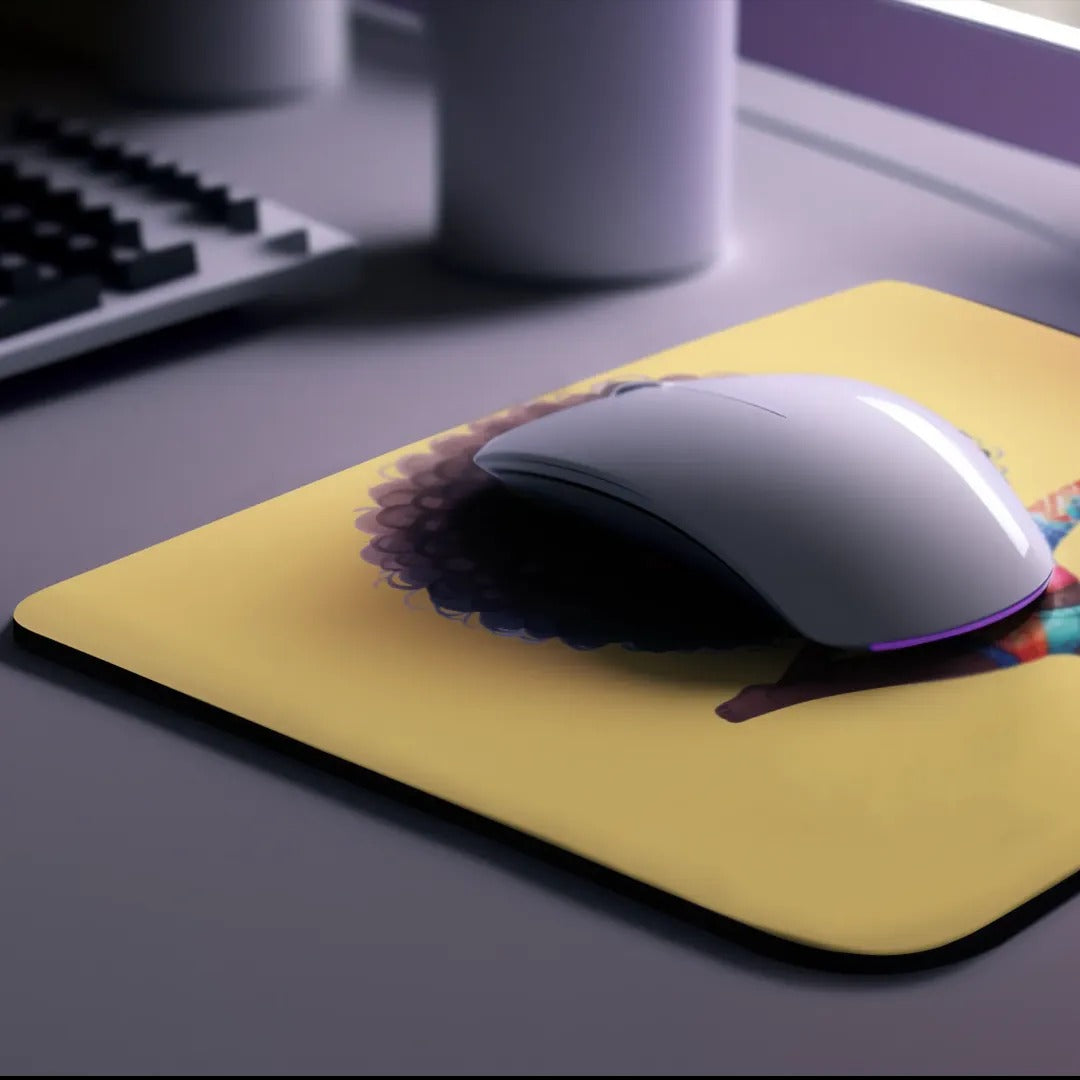 Mouse on a yellow mouse pad with a computer keyboard in the background. Best electronics online store near me. Axis-Dynamics