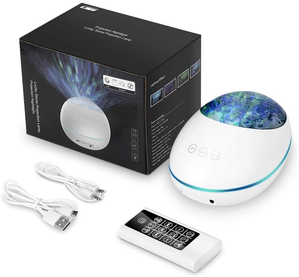 White LED night light with remote control and USB cable on a white background