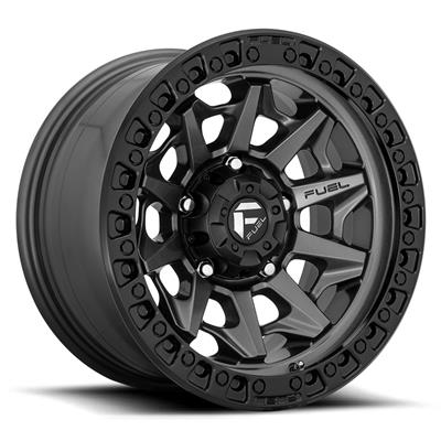 A matte black multi-spoke off-road wheel rim with a rugged treaded outer lip, shown at a three-quarter angle on a white background.  Best automotive parts and accessory online shop. Axis-Dynamics.