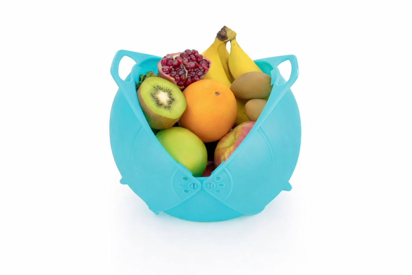 Blue silicone fruit bag filled with various fruits on a white background