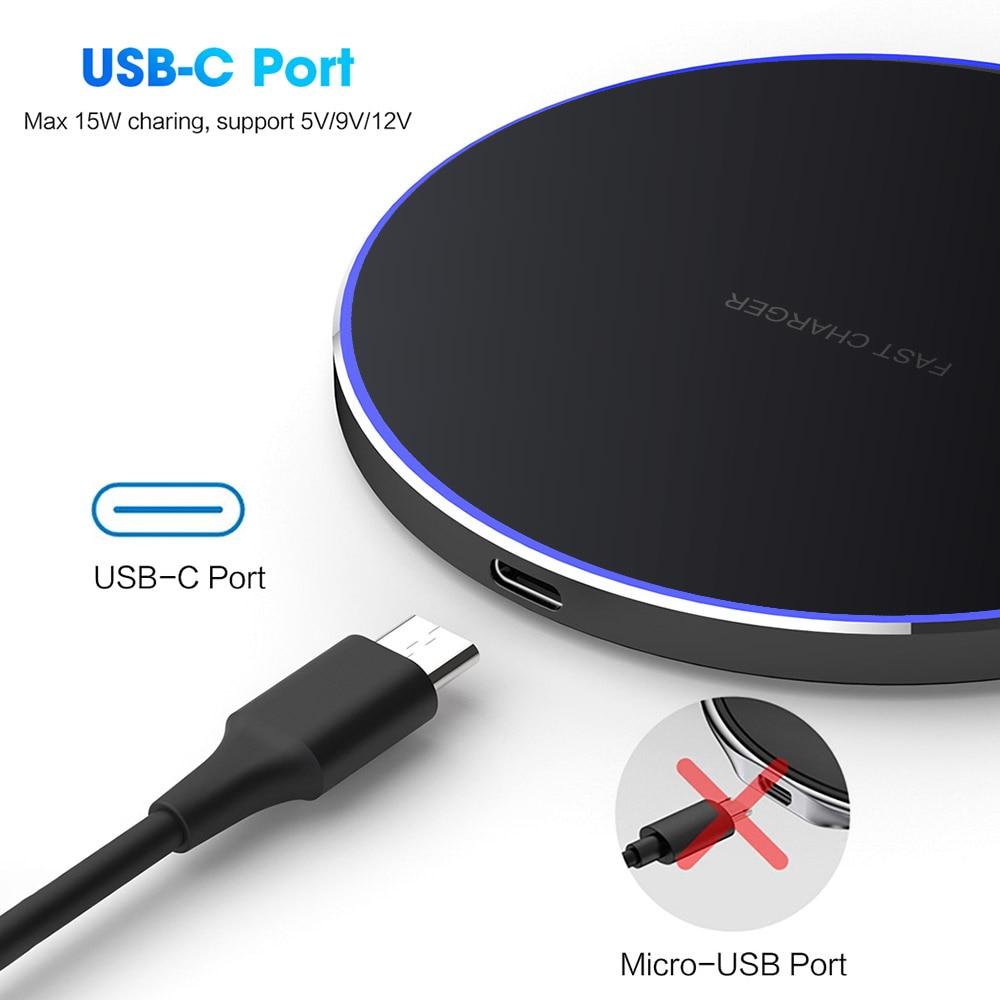 Black wireless charger with USB-C port on a white background