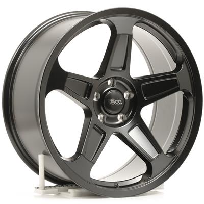 A dark metallic gray multi-spoke alloy wheel rim shown at a three-quarter angle on a white background.  Best automotive parts and accessory online shop. Axis-Dynamics.